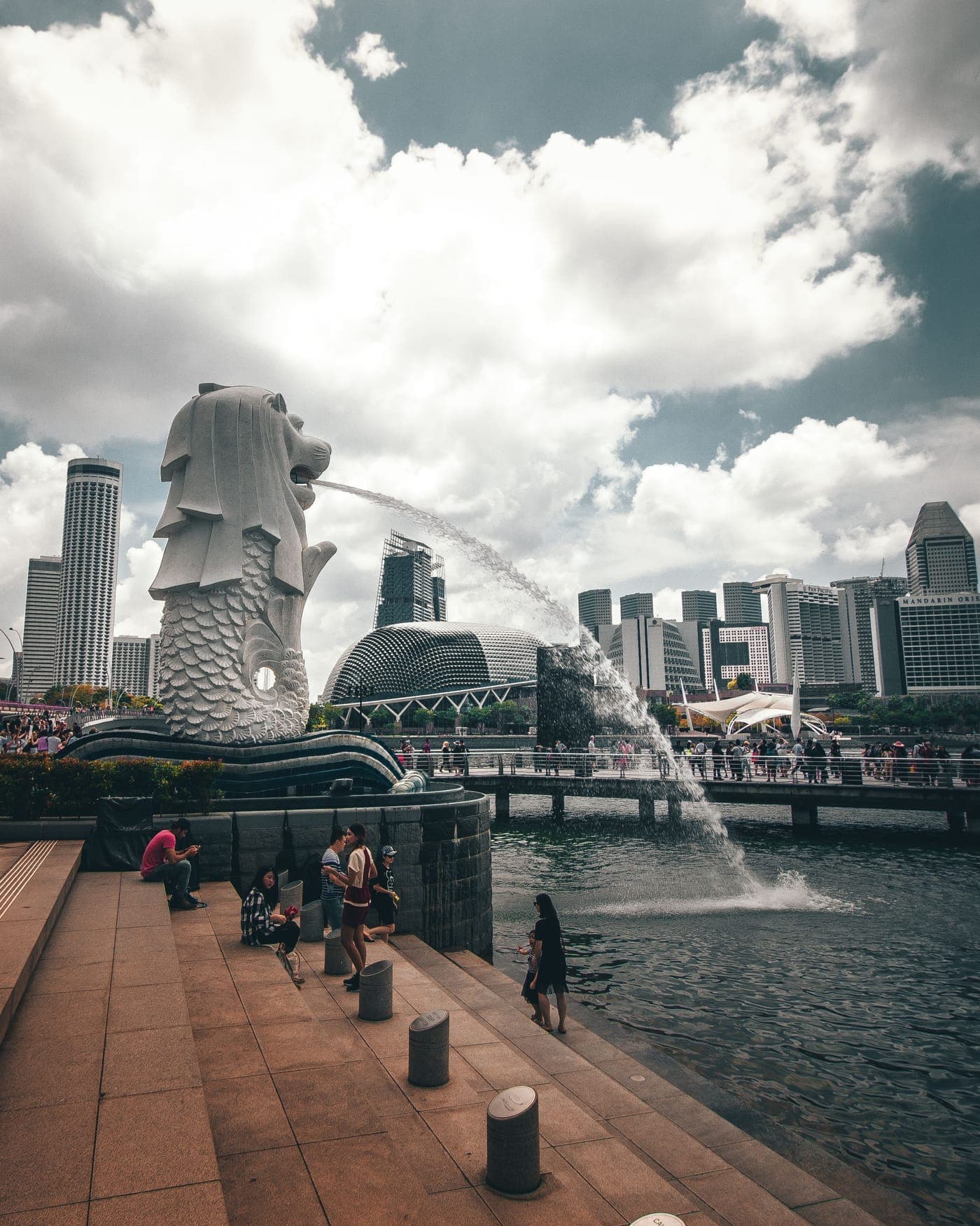 The Merlion spouting into the bay with the CBD behind