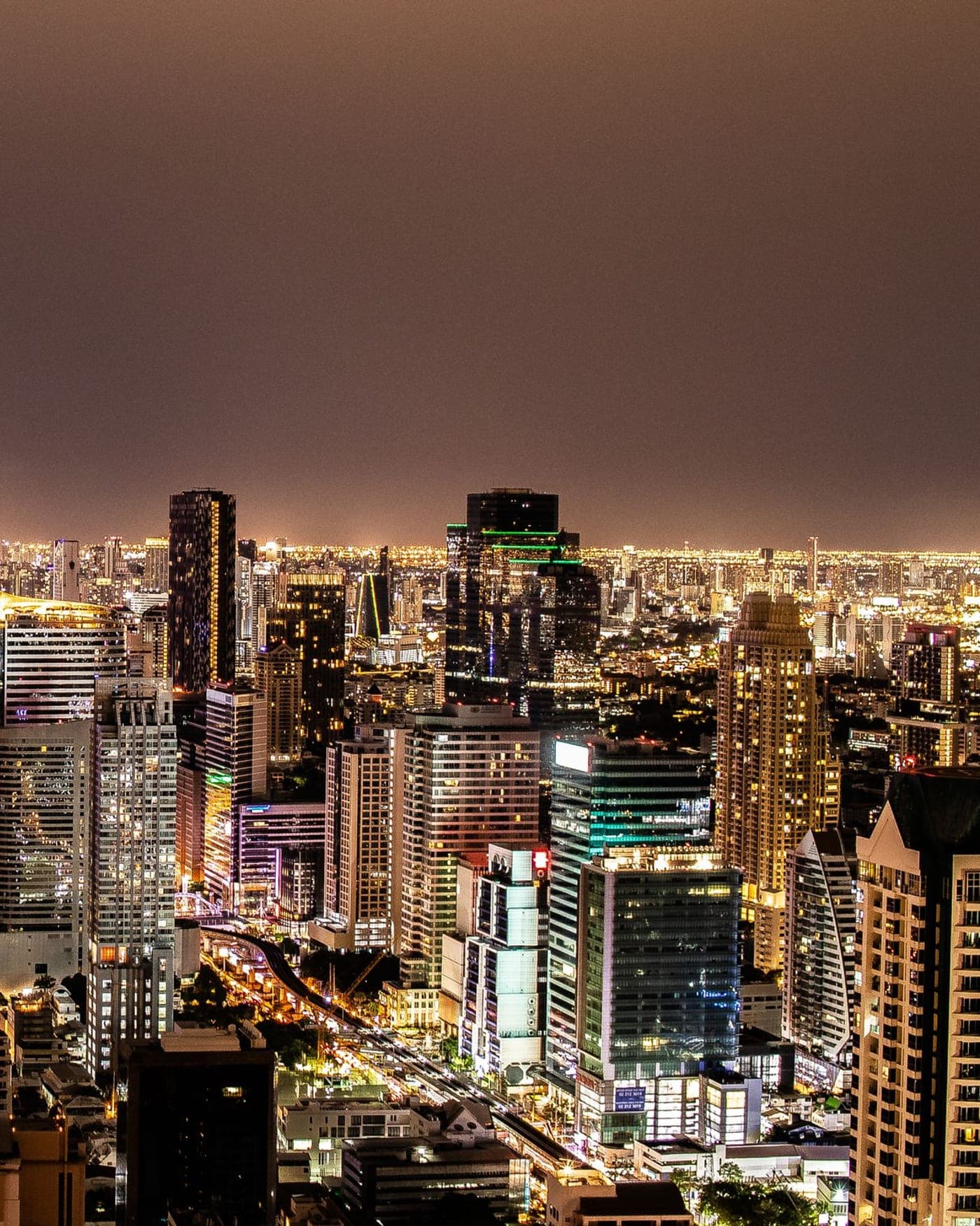 The Bangkok skyline lit at night