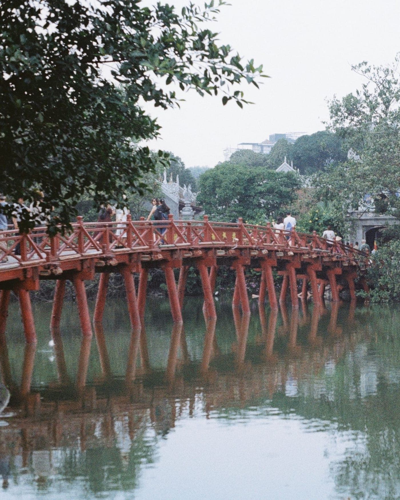 The red Huc bridge over Hoan Kiem Lake